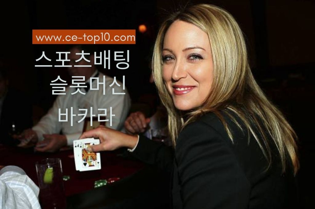 Blonde woman smiled at the camera while playing poker games